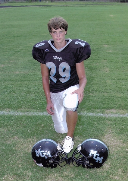 Logan in his Mary Montgomery Vikings football uniform
